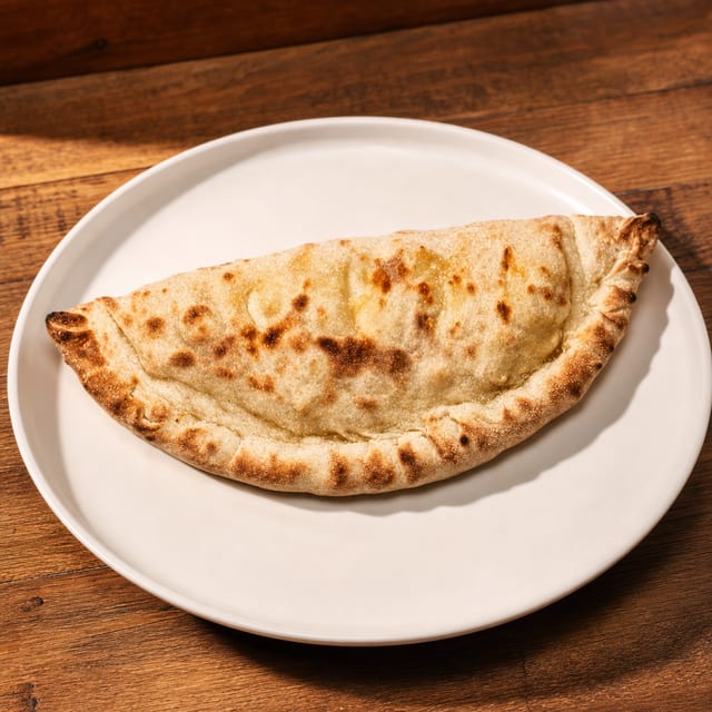 Cheese Steak, Onions and Sauce Panzerotti.